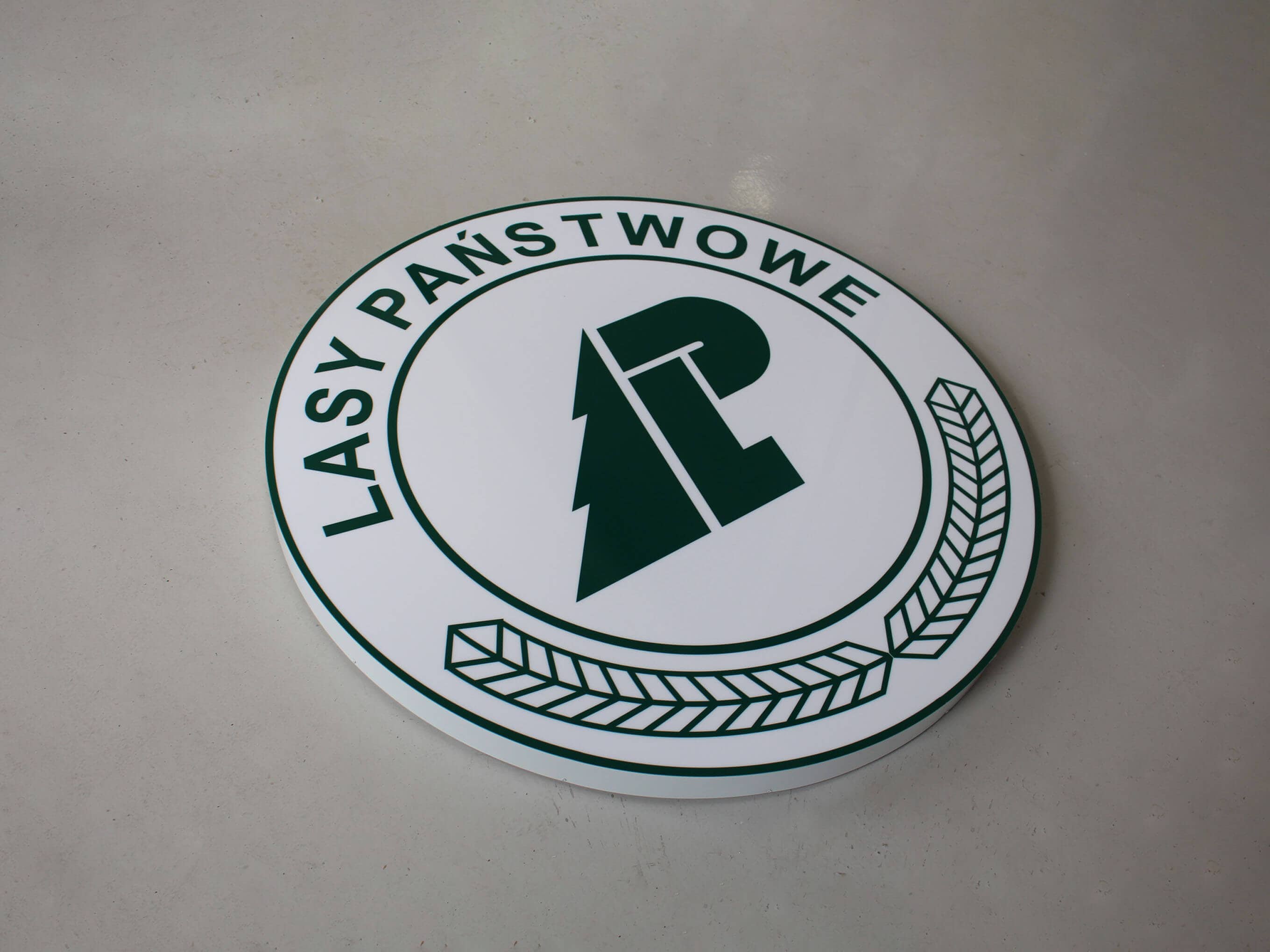 okrągły szyld lasy państwowe